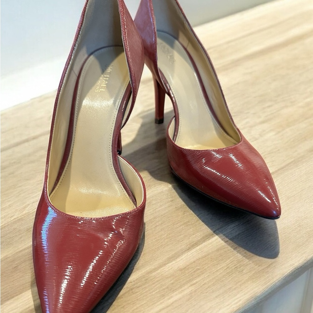 Size 8.5 deep red, patent leather pumps. MICHAEL KORS. Great condition.